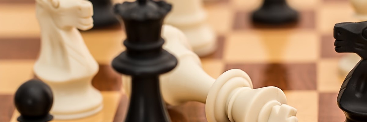 webcard for Chess Club with black Queen defeating white King