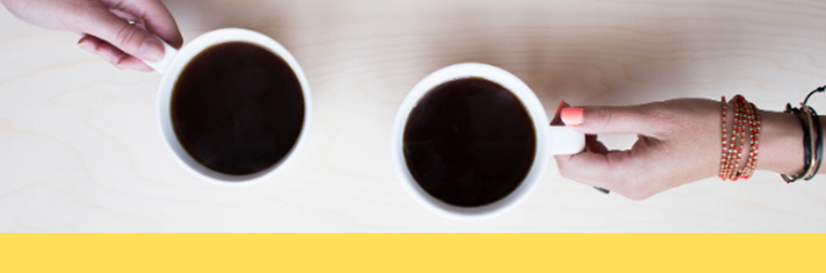 image of hands holding a mug of coffee
