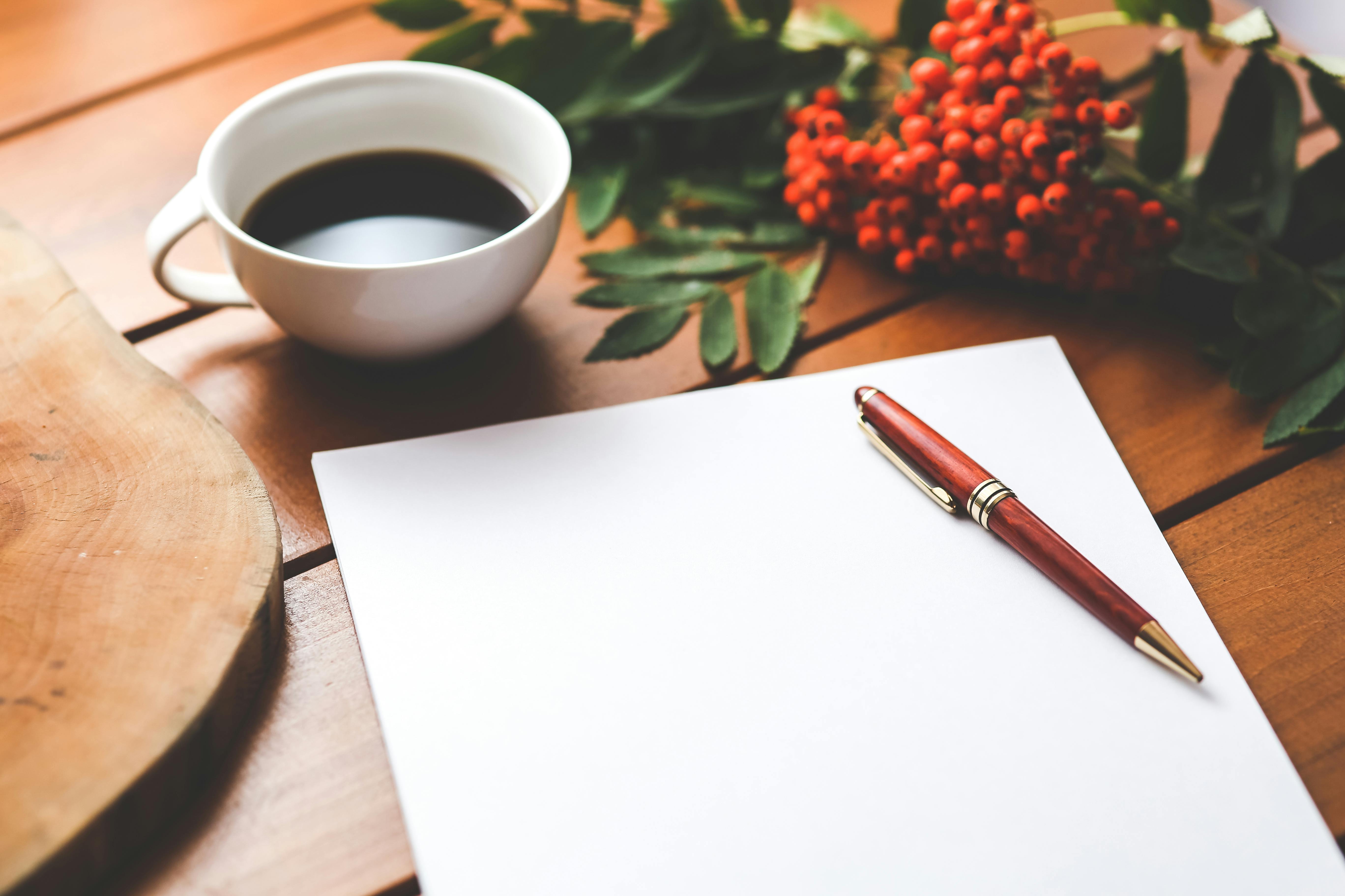 Blank piece of paper and a pen