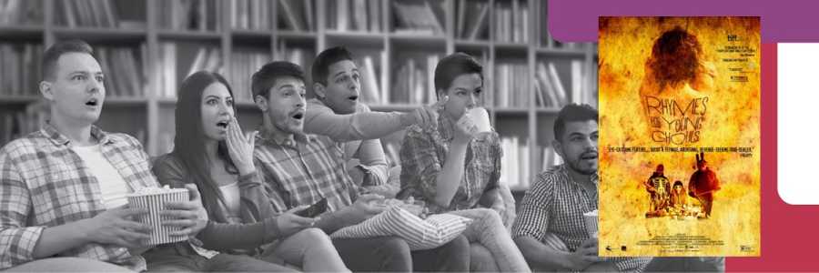 People gawking at a poster for the film Rhymes for Young Ghouls.