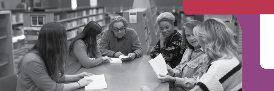 Book club Adults sitting around a table discussing books