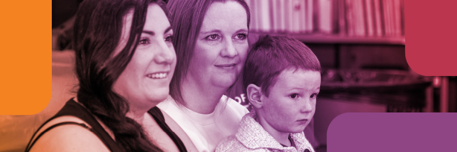 A family of three looks offscreen at a storyteller during storytime