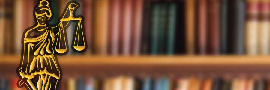 A woman holding the scales of justice