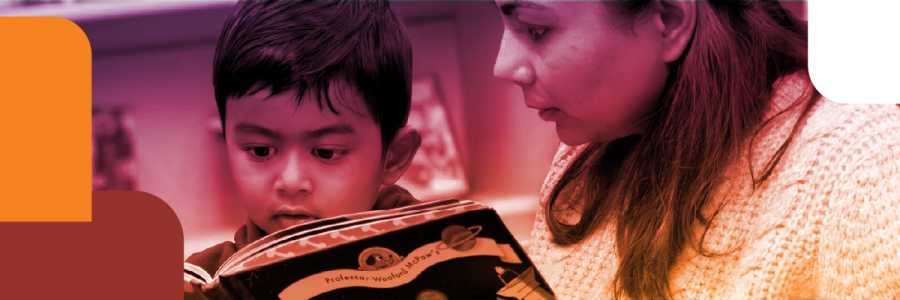 Woman and boy reading together