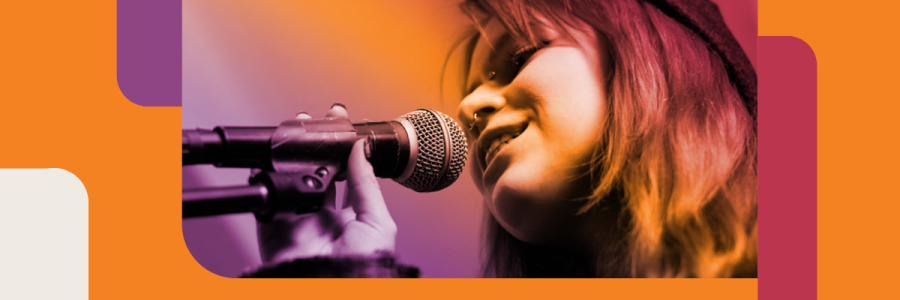 Image of a teen singing into a microphone