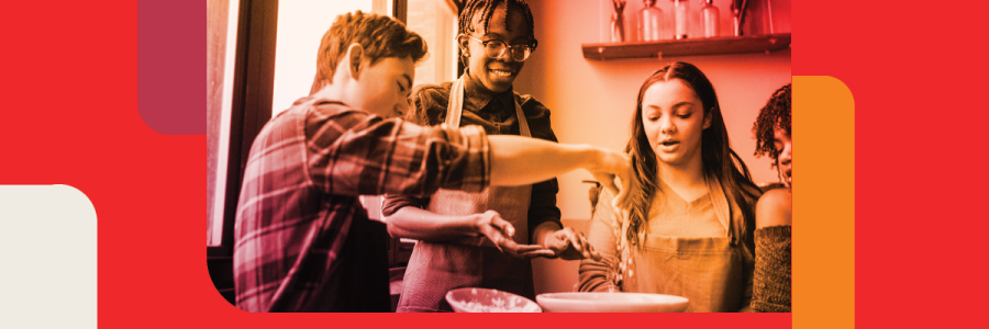 Image of teens preparing a meal together in a kitchen