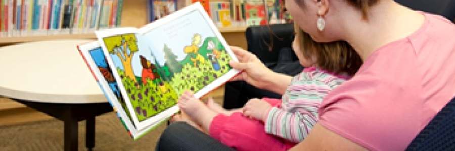 Mom reading story to child